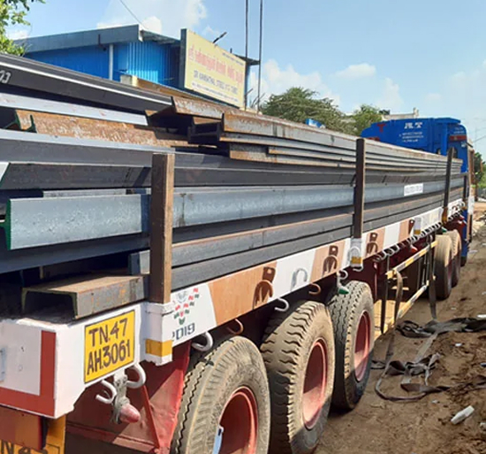 Loaded steel beam truck